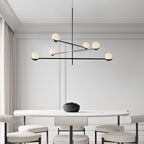White glass Baer pendant light shades at varied heights