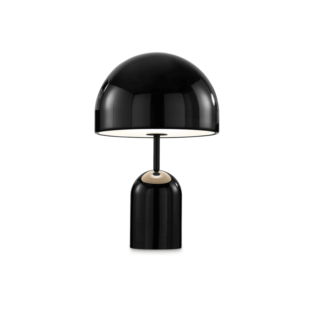This Clérachic table lamp in black shows a thin gold ring accent where the dome meets the stem.