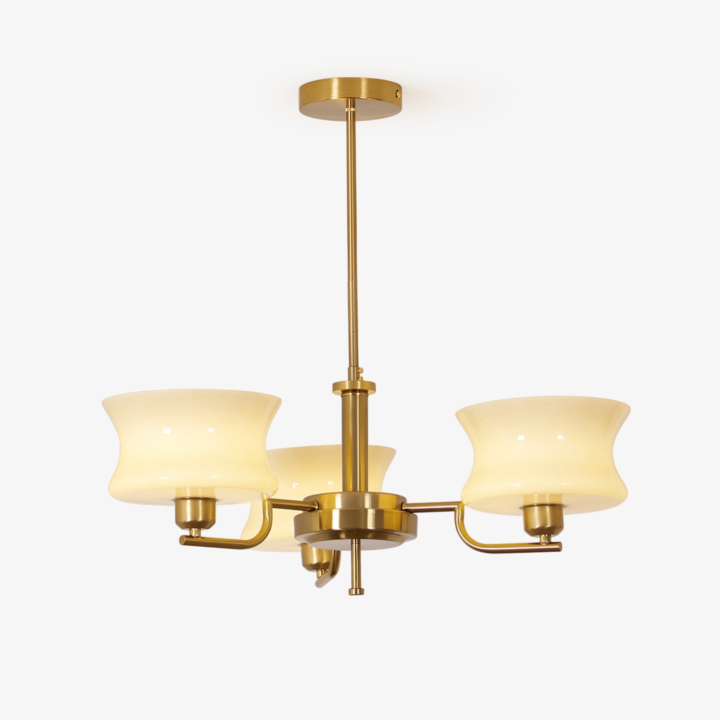 Glass globe chandelier detail showing warm amber light through shades