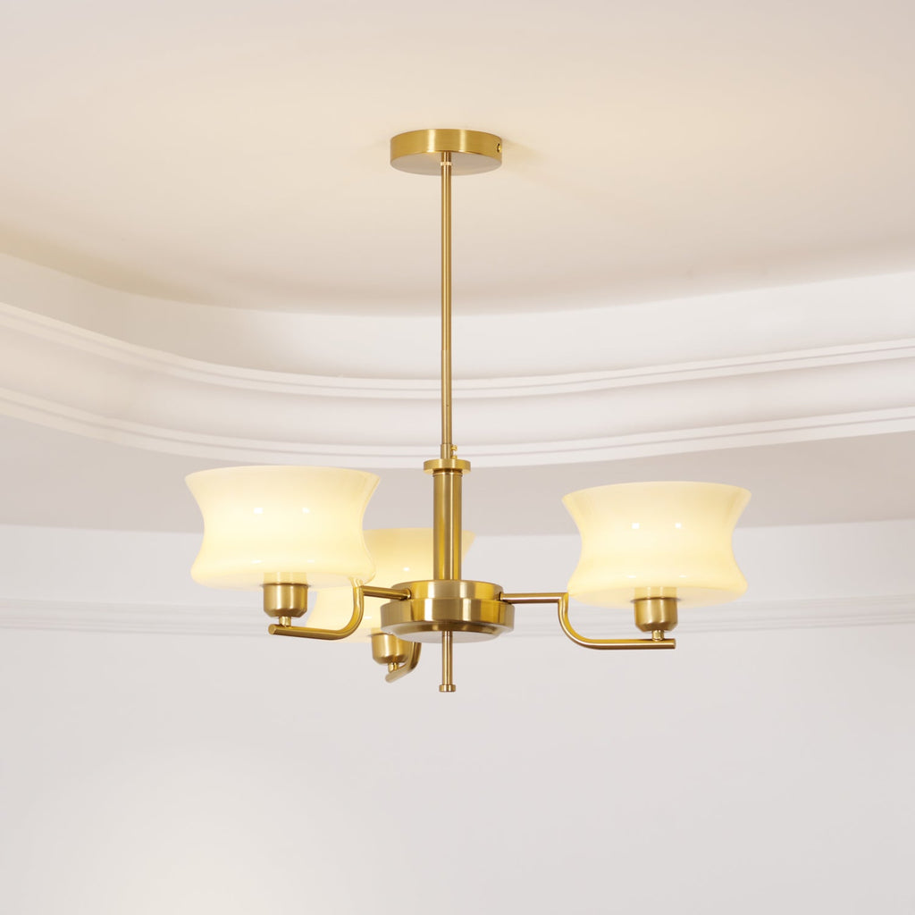 Globe chandelier detail with warm filament bulbs in glass shades