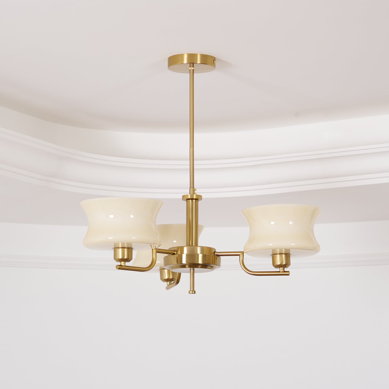 Vintage chandelier with rounded glass globes over a kitchen table