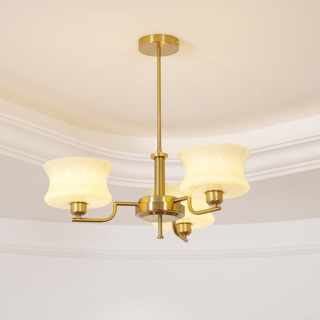 Vintage globe chandelier glowing softly in a dining space