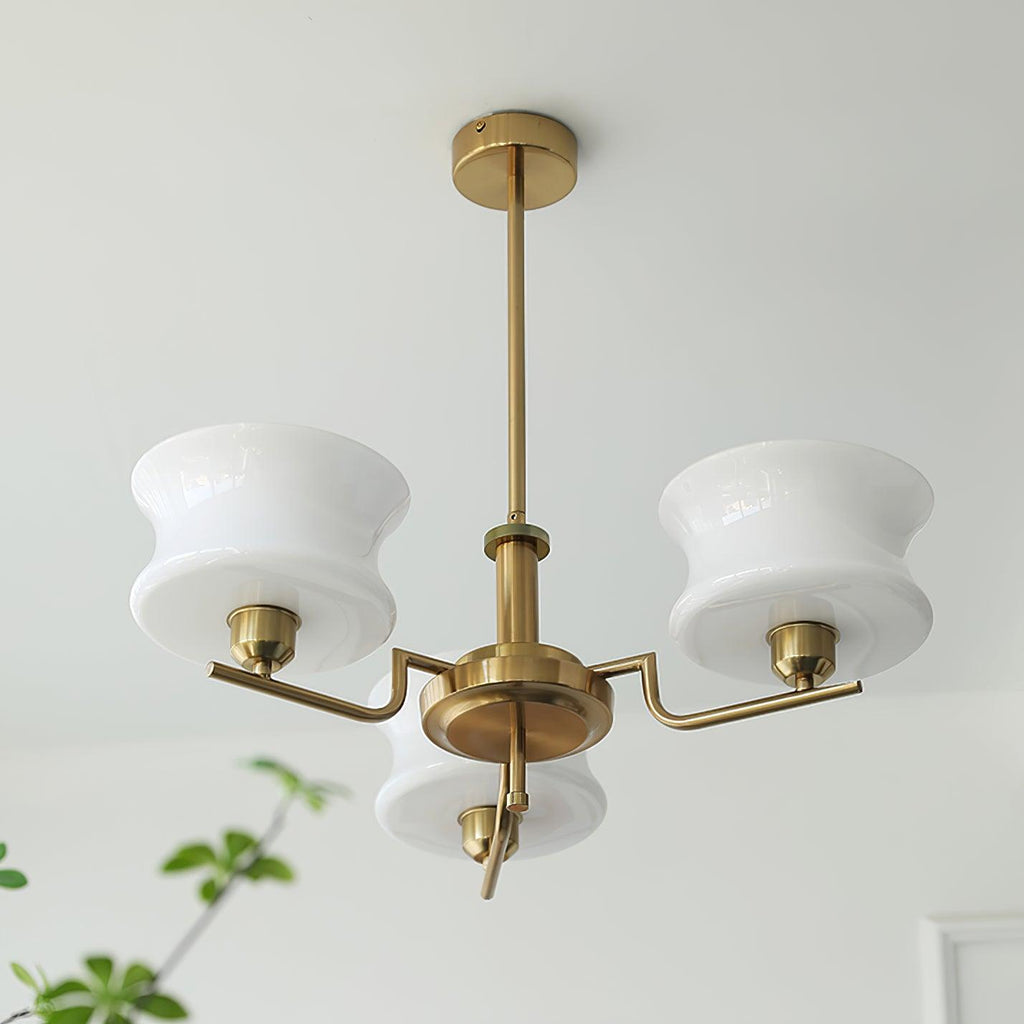 Vintage globe chandelier detail showing metal arms and glass globes
