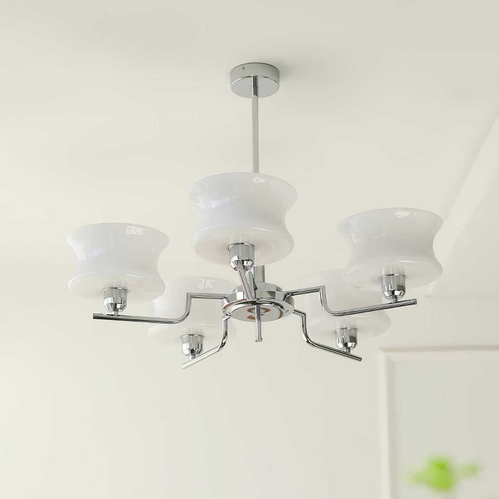 Glass globe chandelier lighting a refined dining room interior