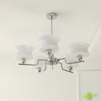 Glass globe chandelier lighting a refined dining room interior
