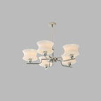 Vintage globe chandelier suspended from an extendable ceiling rod