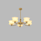 Globe chandelier in chrome finish above a living room sofa