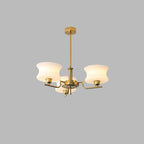Five-head globe chandelier with rounded glass shades and gold finish