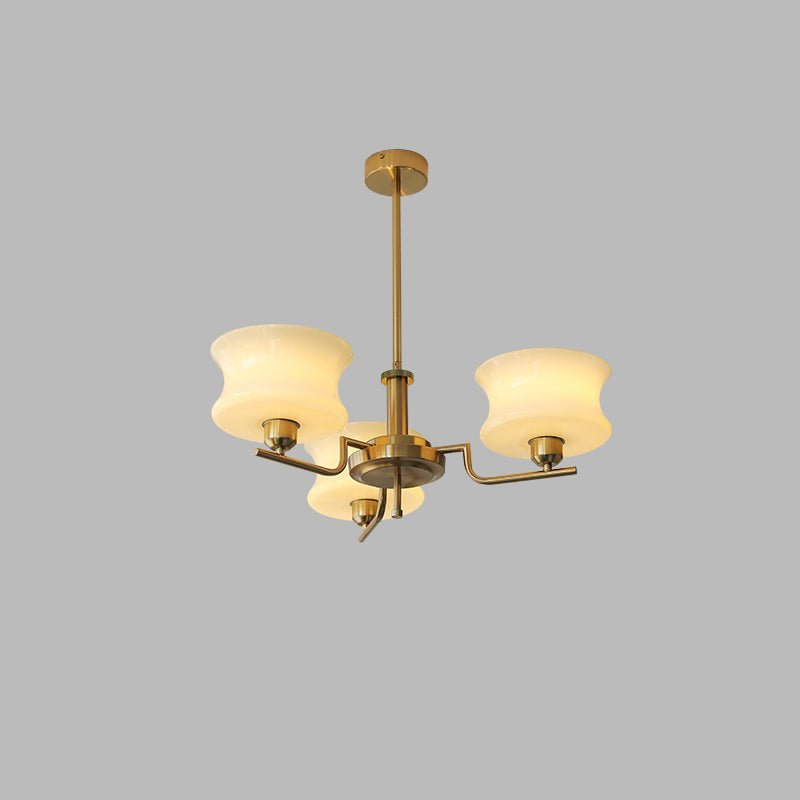 Vintage glass globe chandelier with gold frame and warm shades