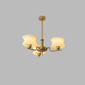 Vintage glass globe chandelier with gold frame and warm shades