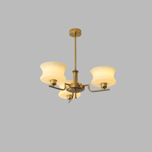 Vintage glass globe chandelier with gold frame and warm shades