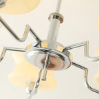 Vintage glass globe chandelier with gold frame and warm glow