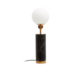A tall crop of the Clérachic desk lamp on white shows the power cord and plug trailing from its brass-ringed base.