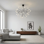 Black firefly LED chandelier casting a soft ambient glow