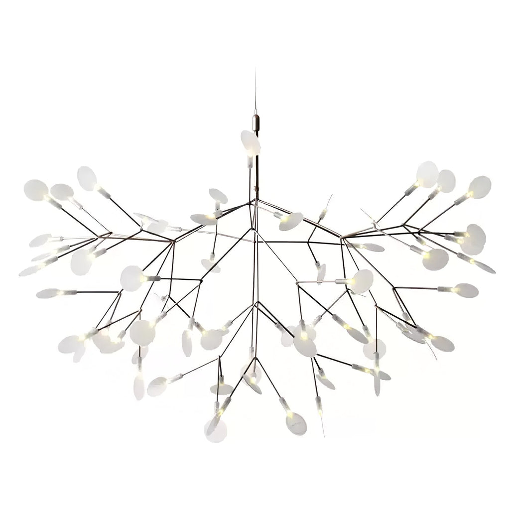 Firefly LED chandelier glowing softly above a dining setting