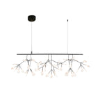 Black branch LED chandelier blooming open across a ceiling