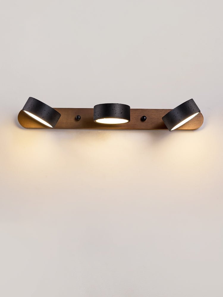 Walnut frame travertine wall light with warm downward glow