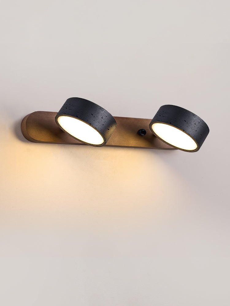 Travertine wall light detail showing natural stone texture