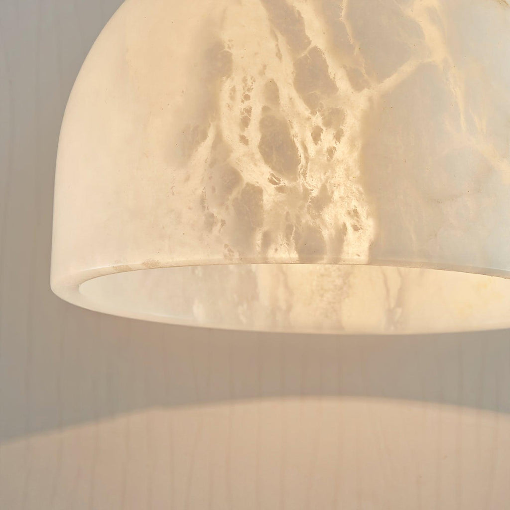 Close-up of the Clérachic alabaster shade's underside from a wider angle, showing more of the interior curve and veining.