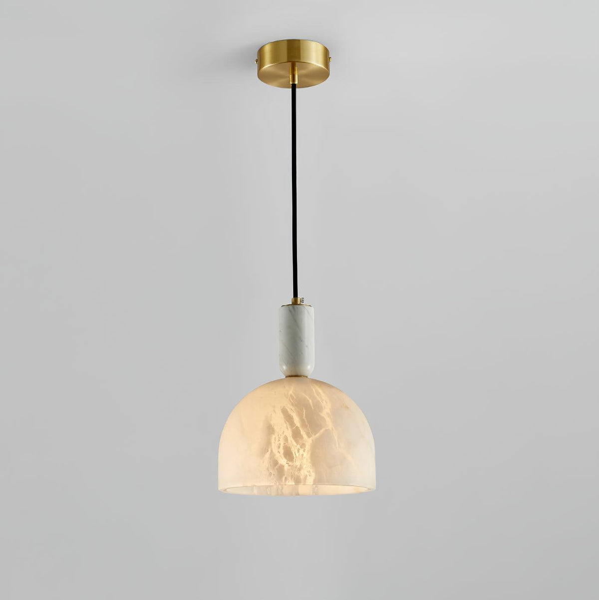 Clérachic alabaster pendant light on a plain grey studio background, shown in full from ceiling canopy to lit dome shade.