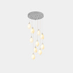 Ceramic bloom pendant light cluster with brass stems and white shades