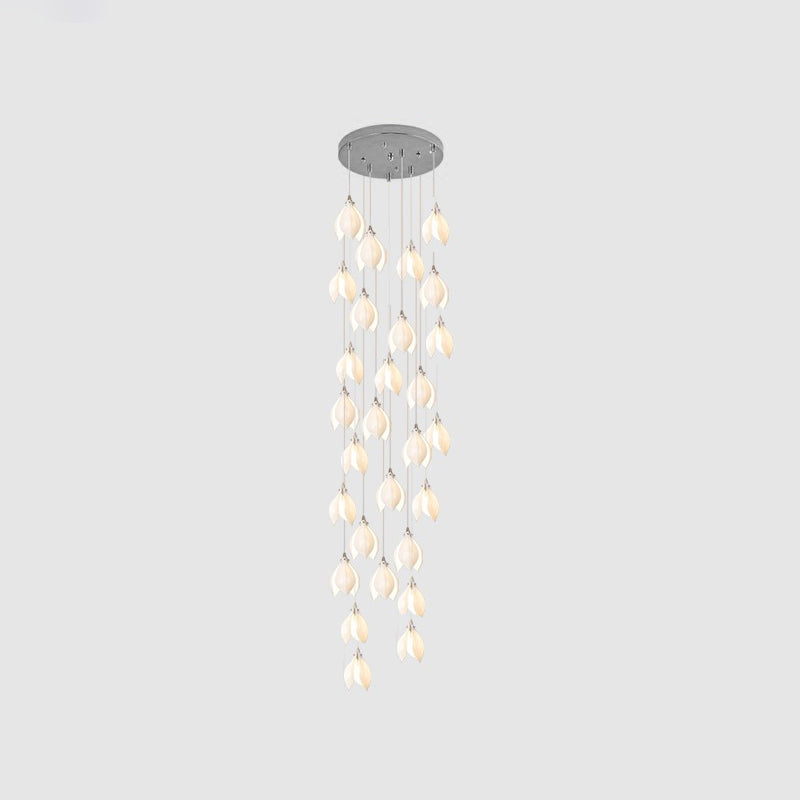 Ceramic flower pendant light installation spanning a high ceiling