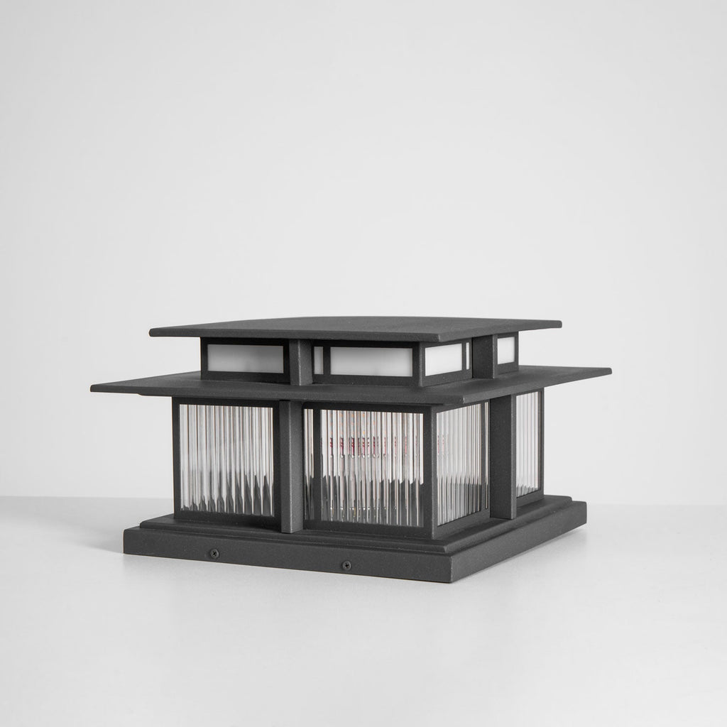 Another angled view of this unlit Clérachic pillar light, its fluted glass panels set within a sandblasted frame.
