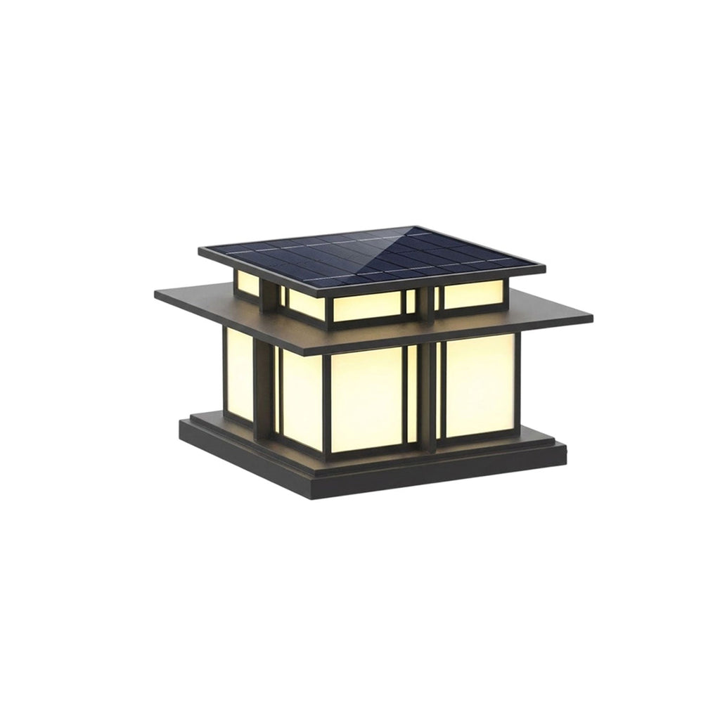 A further angle of this lit Clérachic pillar light, warm light through frosted panels beneath the solar roof.