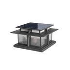 Another view of this unlit Clérachic pillar light with its solar-panel roof and fluted glass sides on white.