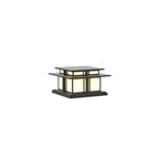 A front view of this unlit Clérachic pillar light against a white backdrop, its frosted glass panels pale and even.