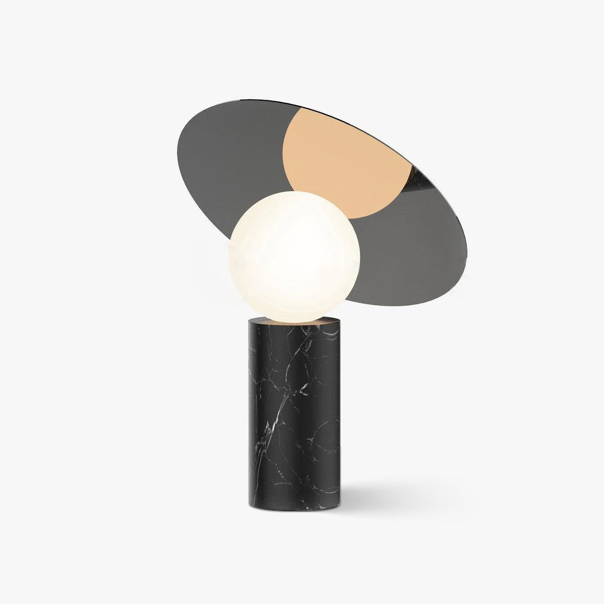 Clérachic tilting disc table lamp on a plain white background, its mirrored grey and gold panels angled above a black marble base.