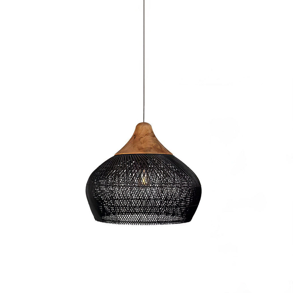 Black woven rattan pendant light shown lit in a calm room