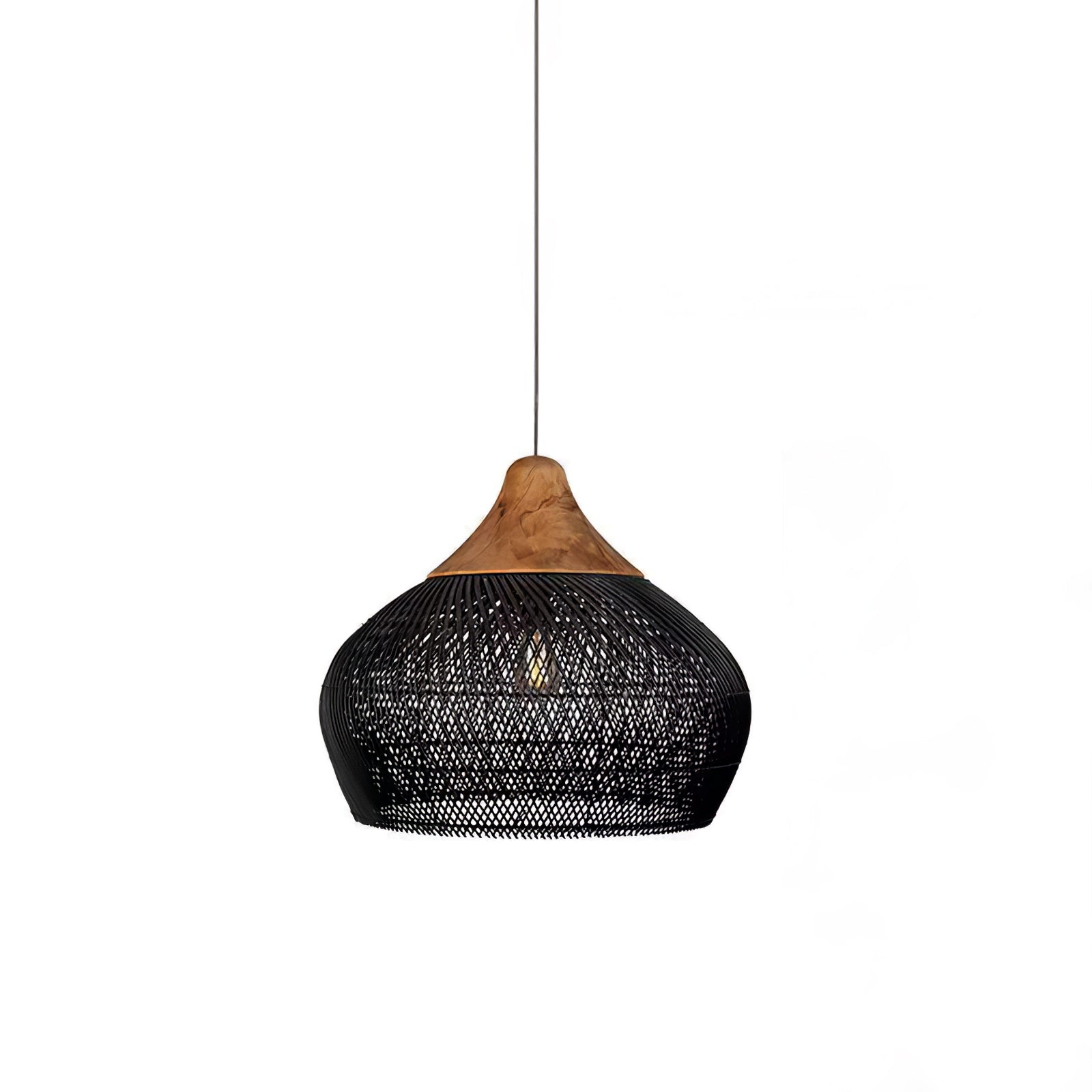Black woven rattan pendant light shown lit in a calm room