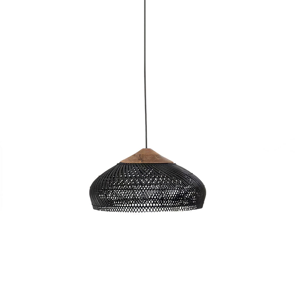 Black rattan pendant light hanging in a styled interior