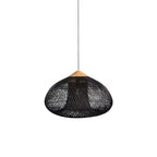 Black rattan pendant light with open woven shade hanging indoors