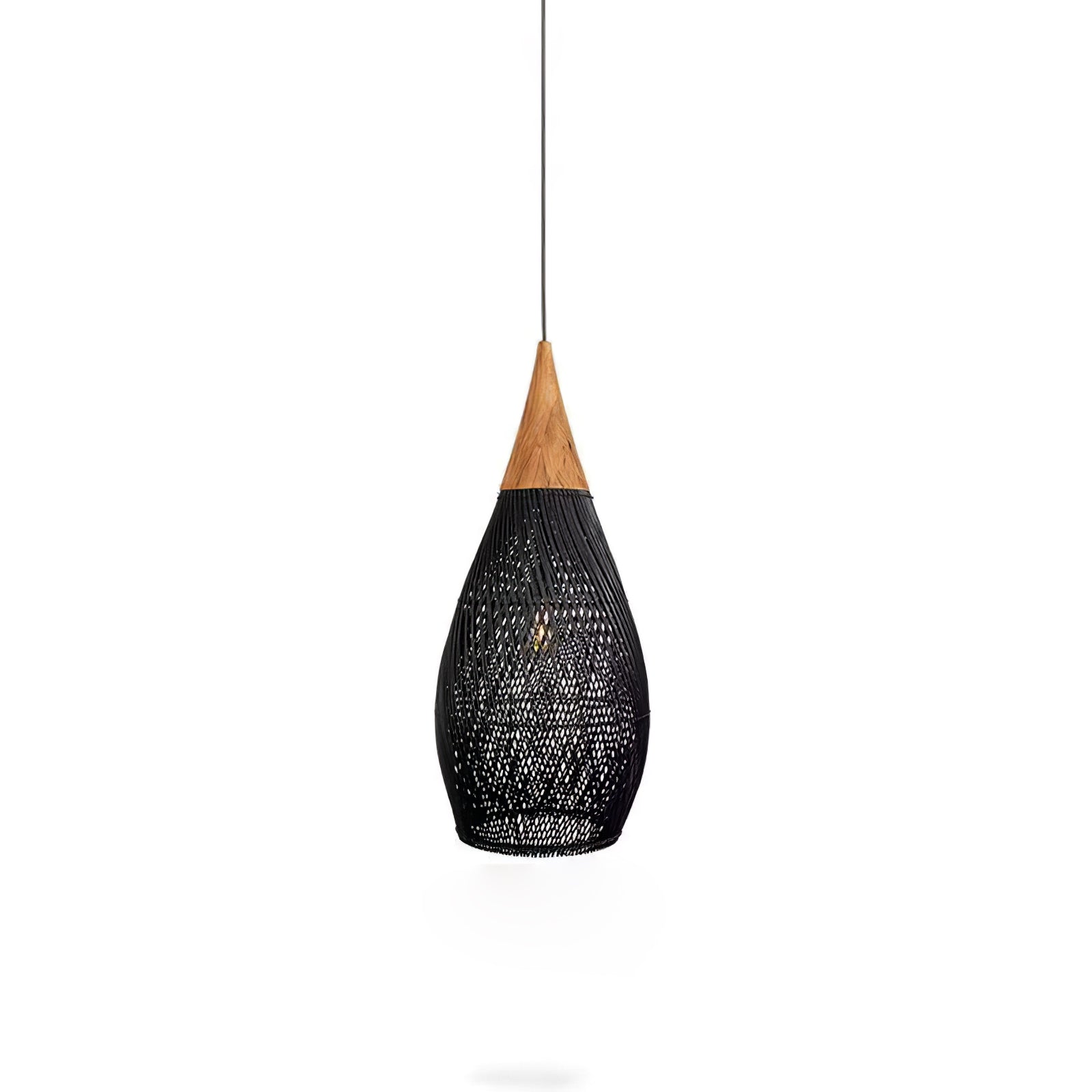 Black woven rattan pendant light hanging over a kitchen island