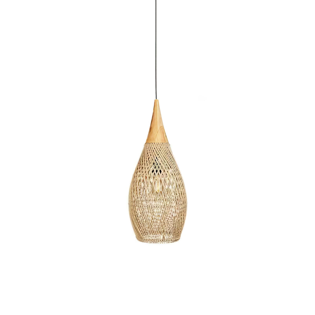 Natural rattan pendant light glowing warmly above a seating area
