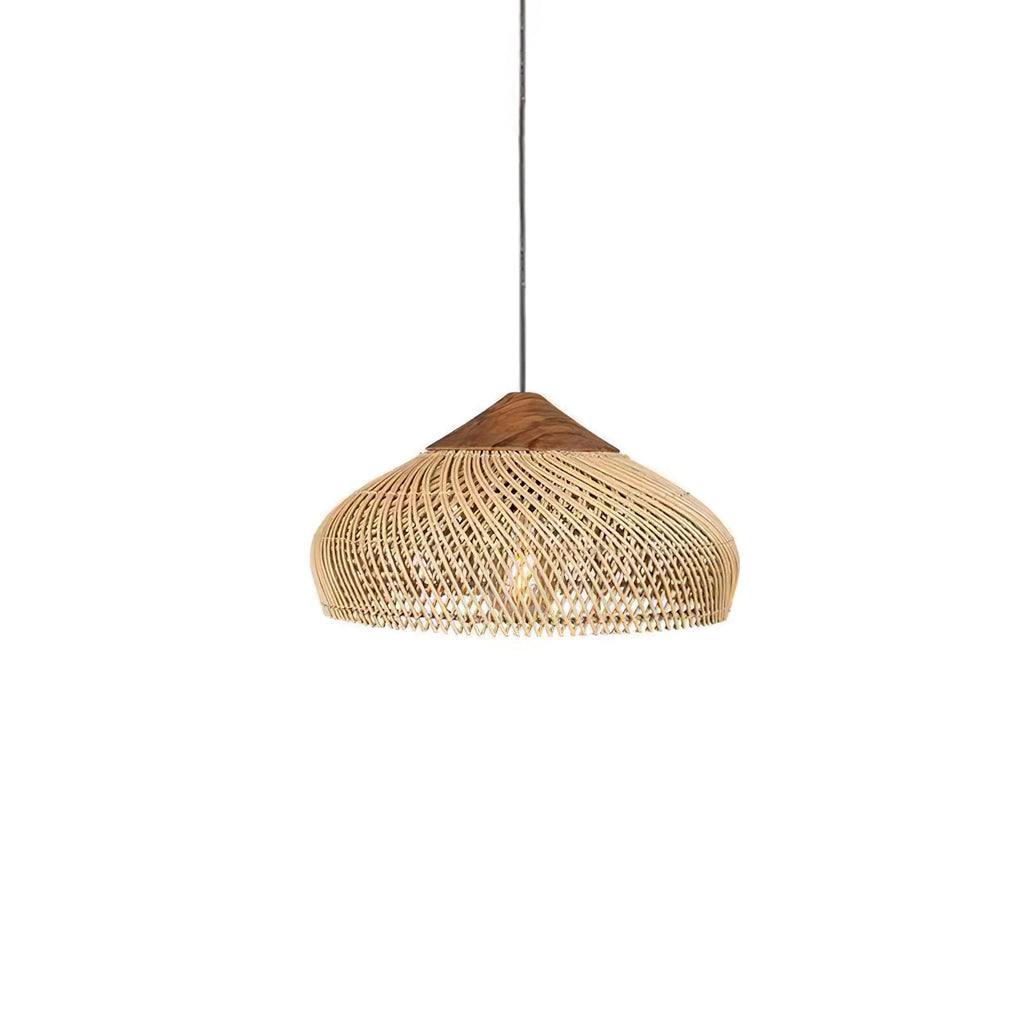 Drum-shaped natural rattan pendant light over a dining table