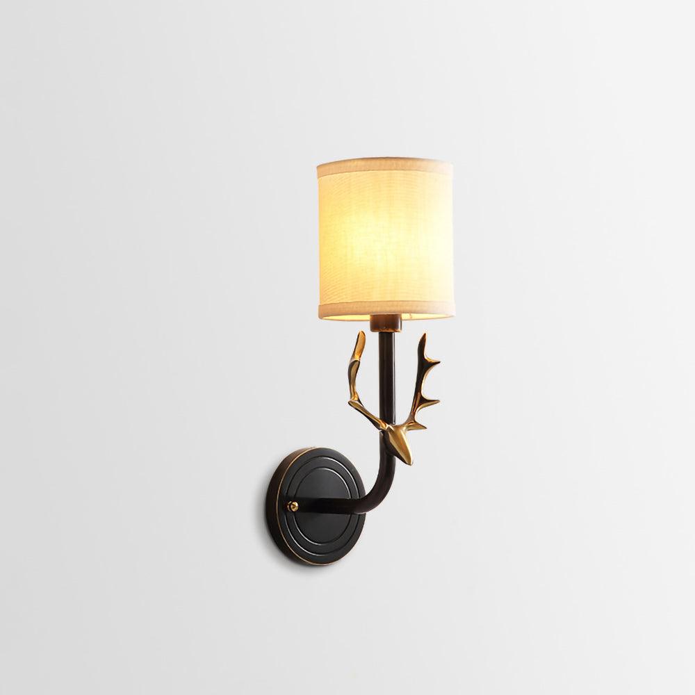 Sculptural brass deer head wall light with two linen lampshades