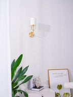 Deer head wall light in brass with circular back panel detail
