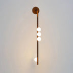 Glass tube wall lamp with hand-blown white globes on brass arms