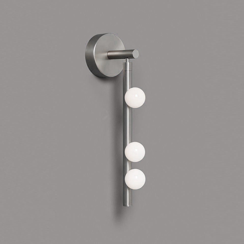 Nickel finish glass tube wall lamp with white blown glass globes