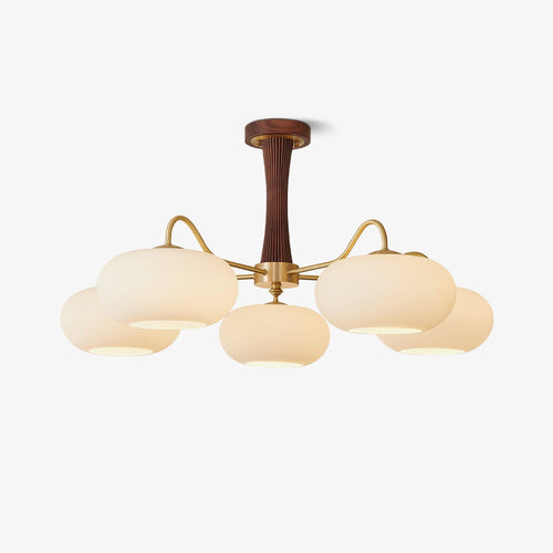 Persimmon chandelier suspended in a styled interior