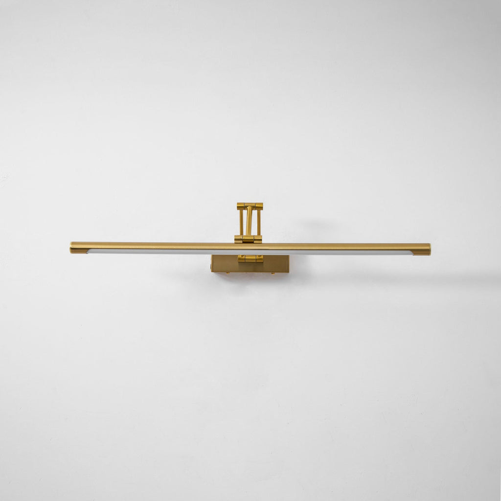 Slim gold LED picture light mounted above a framed picture