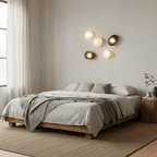 Pebble glass wall lamp shown mounted at eye level