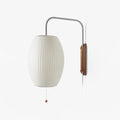 Bubble ball wall sconce with round white shade and walnut accent