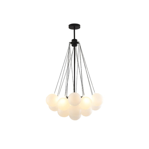 Cloud-like chandelier of hand-frosted glass orbs lit softly