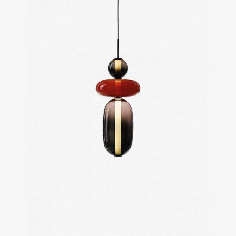 Coloured glass jar pendant lights arranged in a row