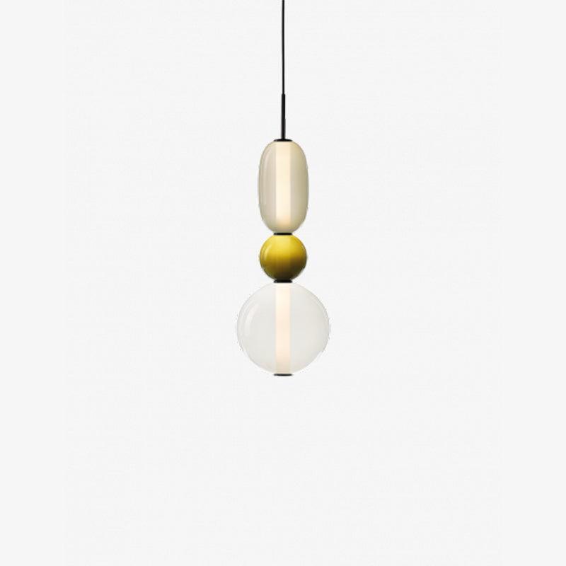 Cluster of coloured glass jar pendant lights hanging together
