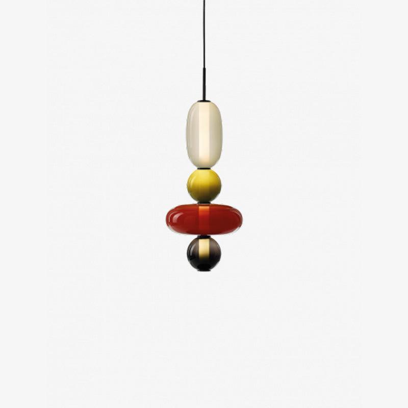 Group of glass jar pendant lights in varied silhouettes